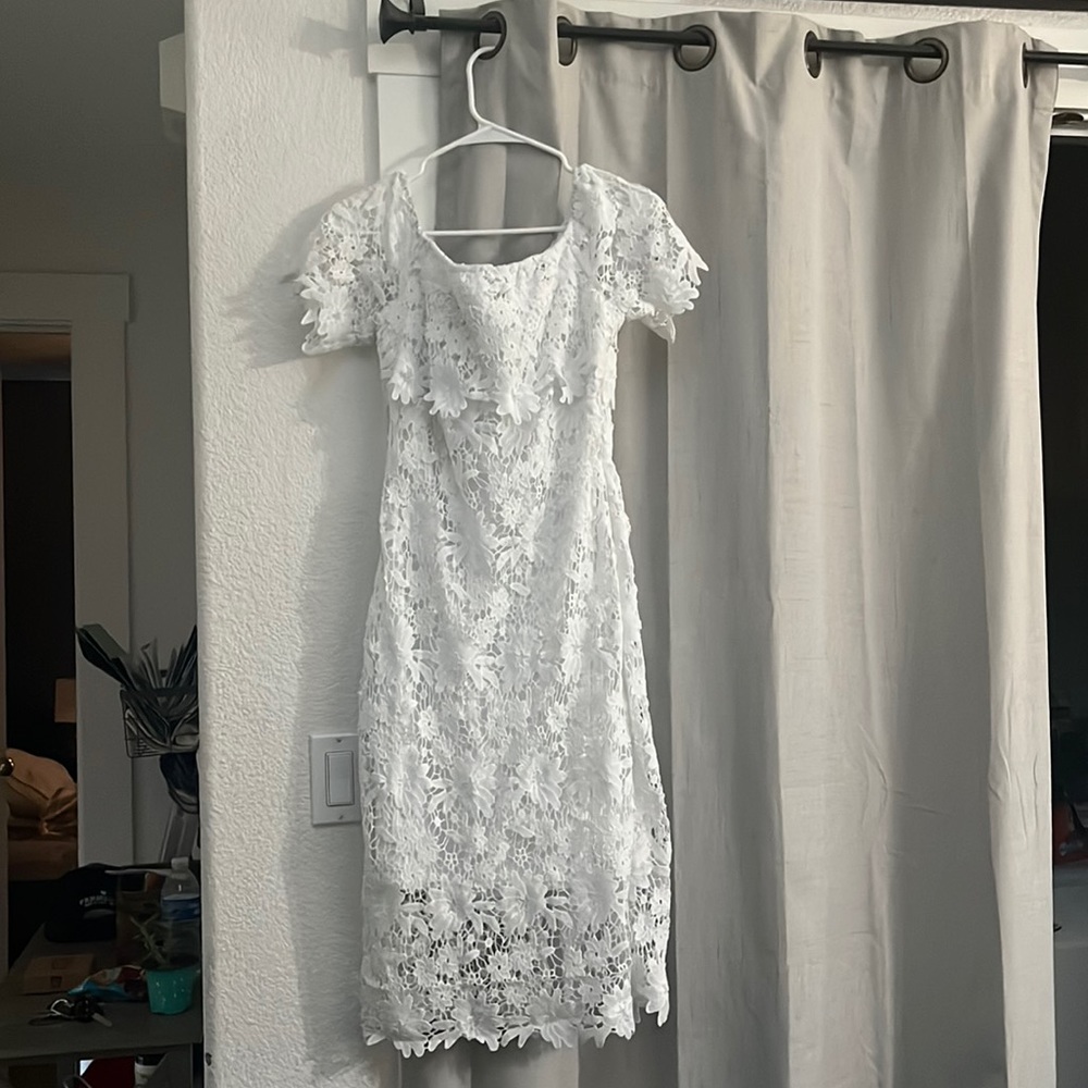 White lace dress used for one night during bachelorette breakfast